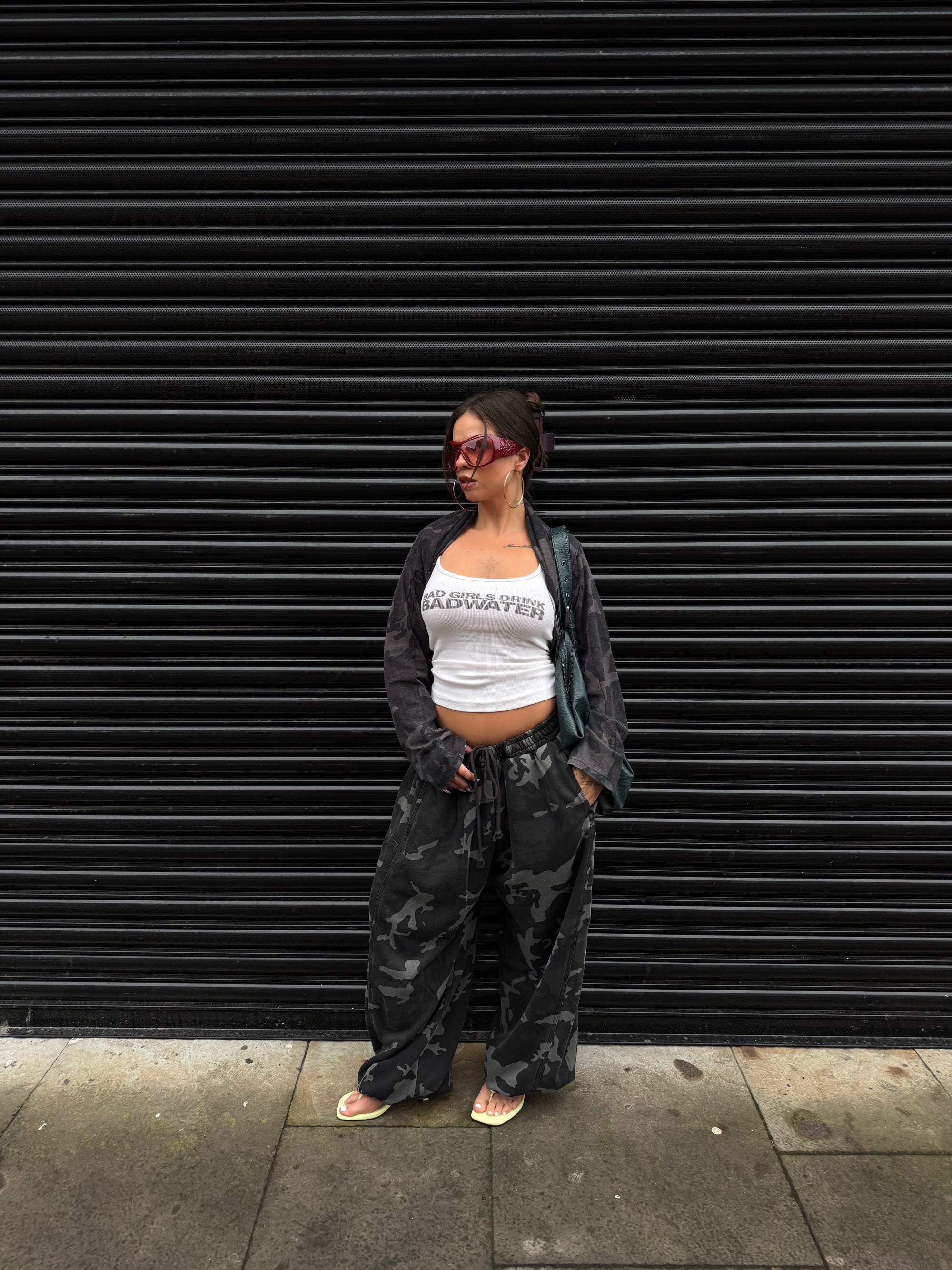 Weekday camo zip-up hoodie styled with matching camo joggers.